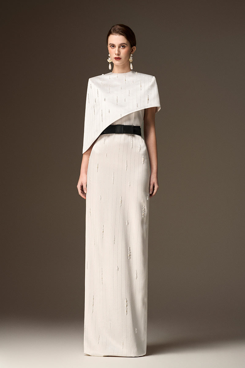 Valentina white metallic asymmetric cape gown by I.H.F featuring a round neck and elegant silk fabric.