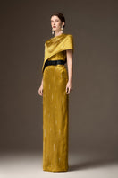 Yellow metallic silk asymmetric cape gown by I.H.F featuring a round neck and elegant column silhouette.