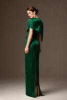 Valentina dark green metallic asymmetric cape gown by I.H.F, featuring a round neck and elegant silken striped fabric.