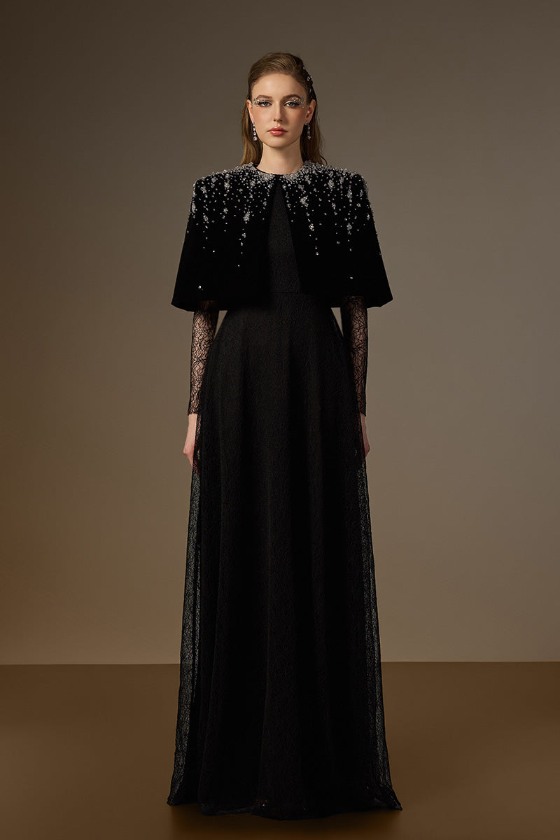 Black mini cape gown by I.H.F with lace A-line design, round neck, and intricate vine Guipure lace details.