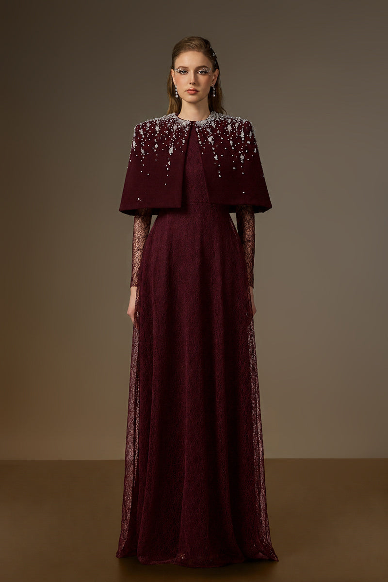 Dark red VIVIENNE I.H.F mini cape A-line gown with lace and velvet details, featuring a round neckline and elegant silhouette.