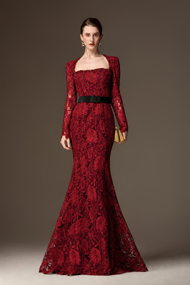 I.H.F burgundy lace mermaid gown with a waist belt and trapeze neckline, featuring floral lace details in dark red.