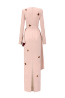 Beige crepe trapeze-neck tie dress with diagonal hip drape by I.H.F, shown on a hanger with flowing fabric and elegant design.
