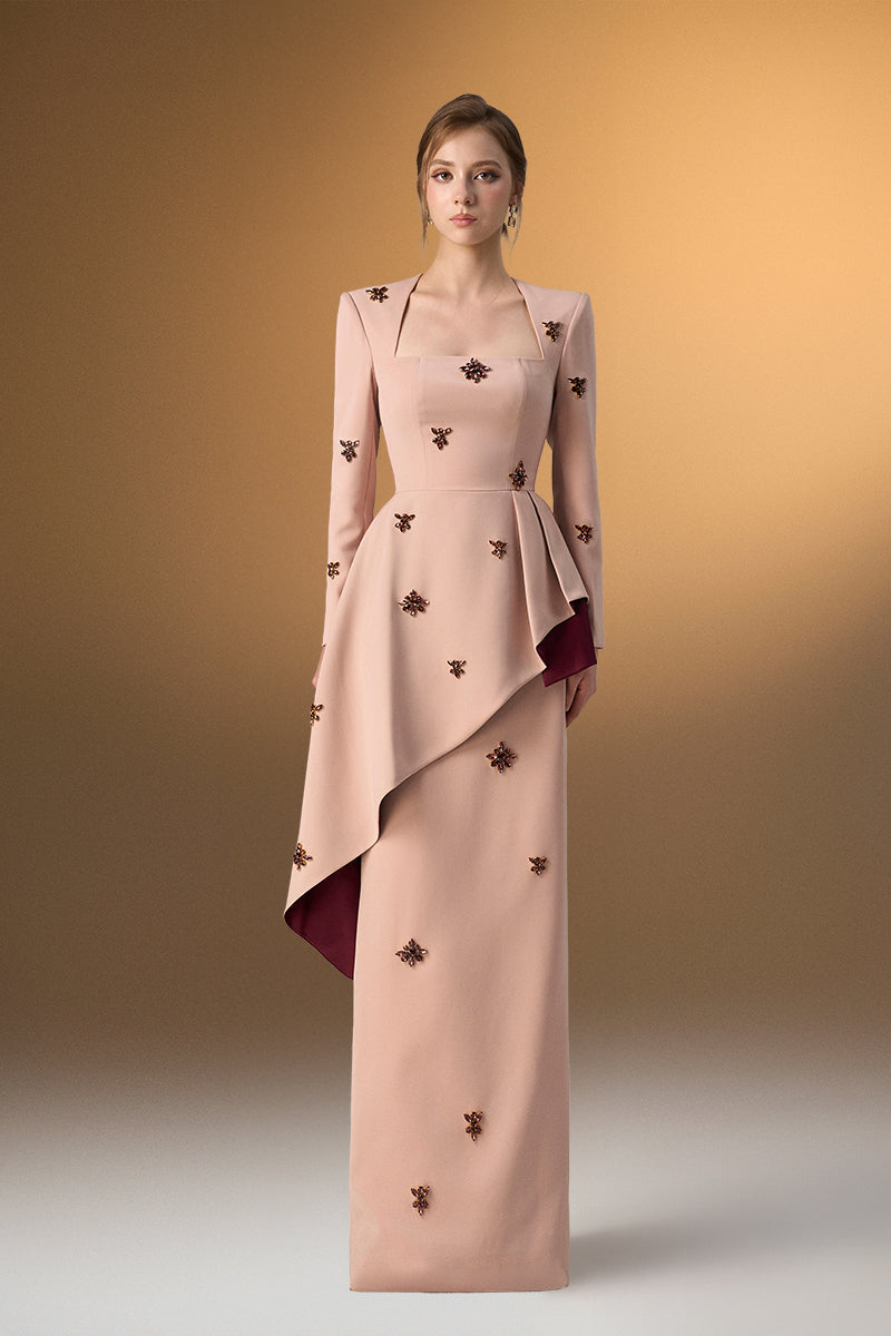 Beige crepe trapeze-neck tie dress with diagonal hip drape, designed by I.H.F, shown on a model in an elegant gown style.