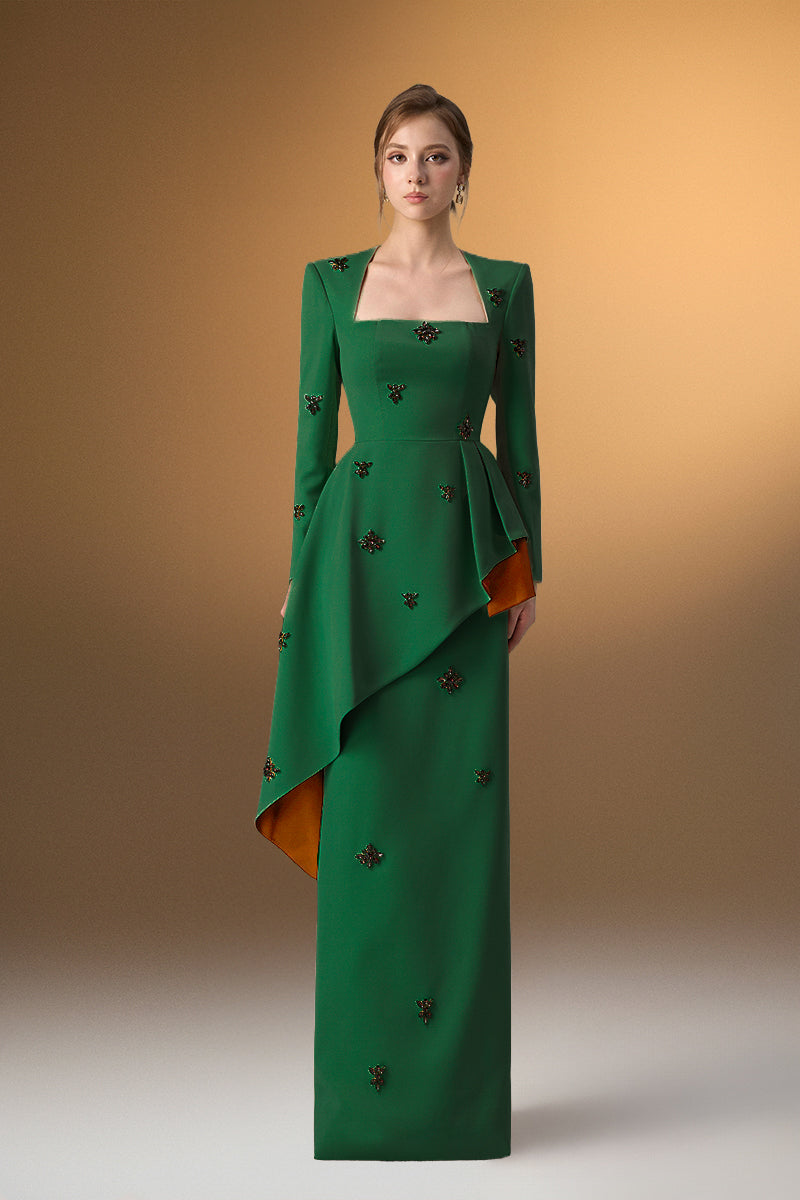 Green crepe trapeze-neck tie dress with diagonal hip drape, elegant gown by I.H.F, shown on a model in a stylish setting.
