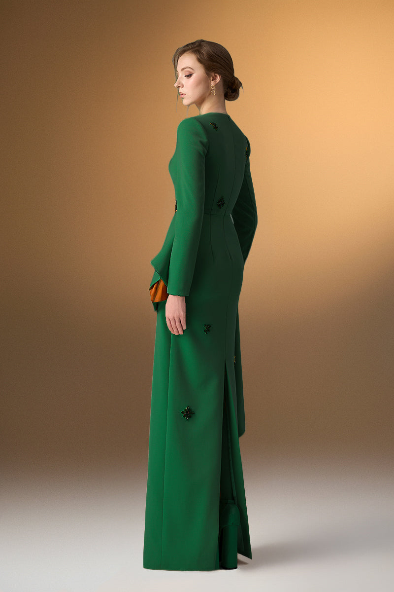 Green crepe trapeze-neck tie dress with diagonal hip drape, stylish gown by I.H.F. displayed on a hanger.
