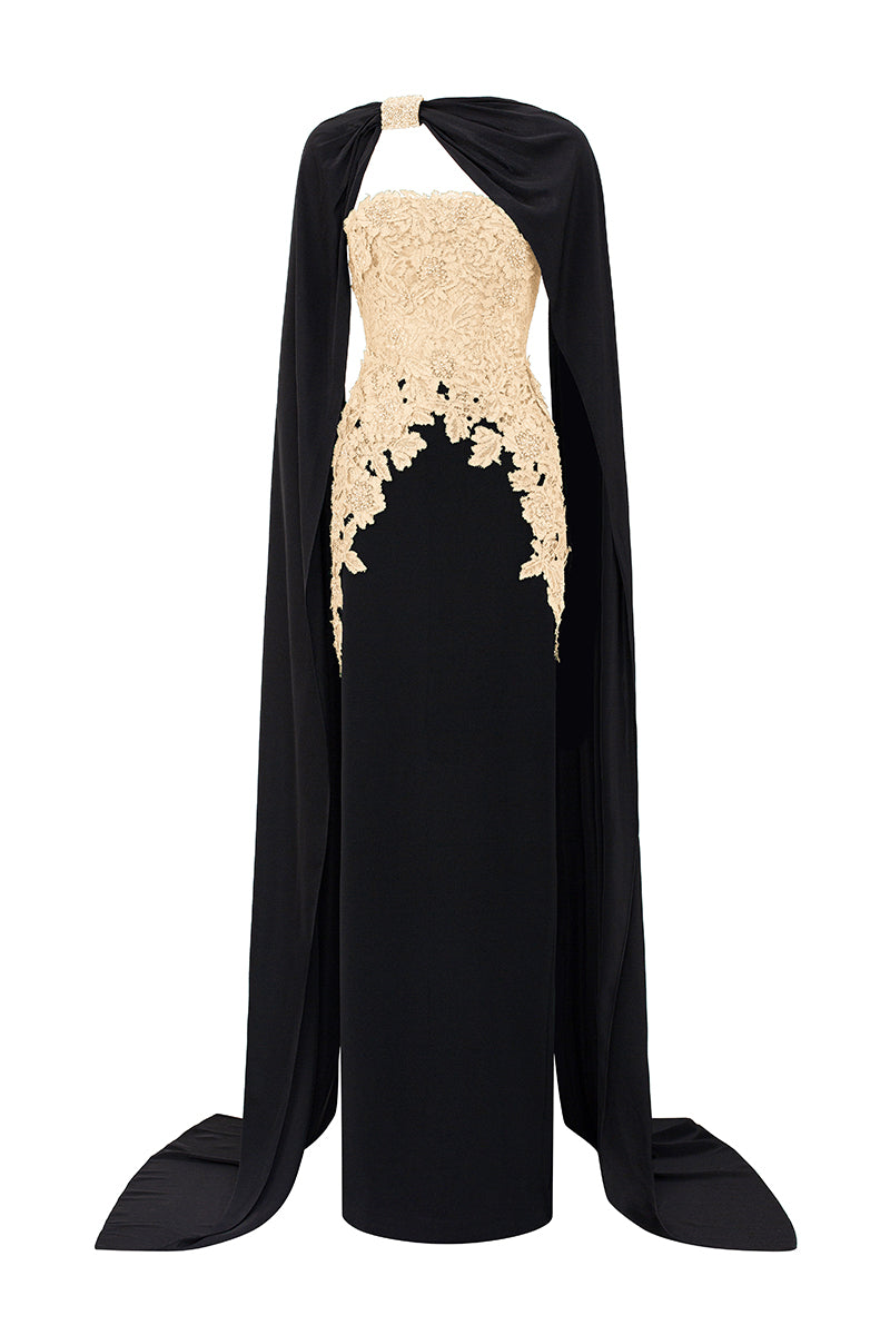 Elegant beige strapless column gown with a long cape by I.H.F, featuring a sleek silhouette and flowing fabric.