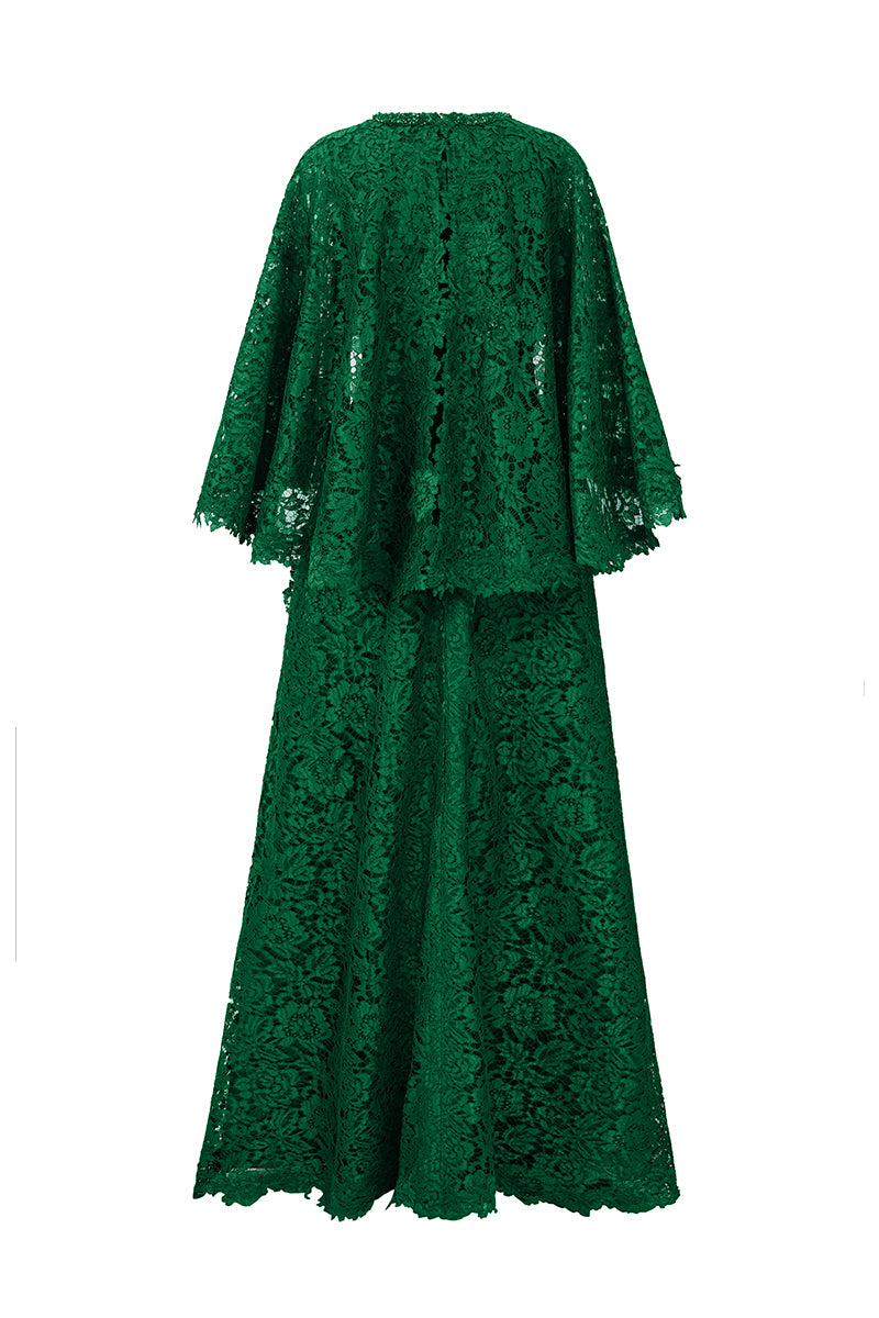 Elegant green A-line gown with a mullet cape by I.H.F, featuring flowing fabric and stylish design for formal occasions.