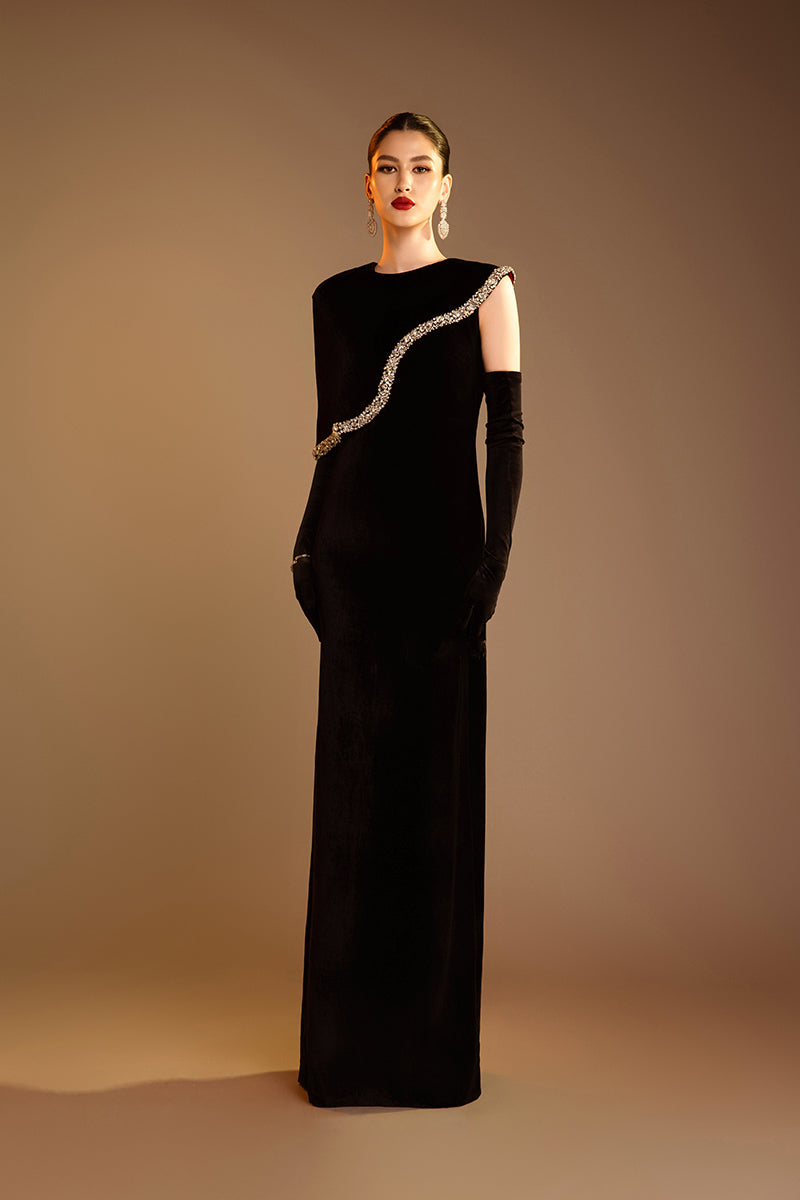 Valenciani black gown with gem-embellished trim cape, elegant evening dress with luxurious details and flowing fabric.