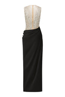 Elegant black silk satin and tulle gown by 21Six, featuring a flowing silhouette and intricate fabric details.
