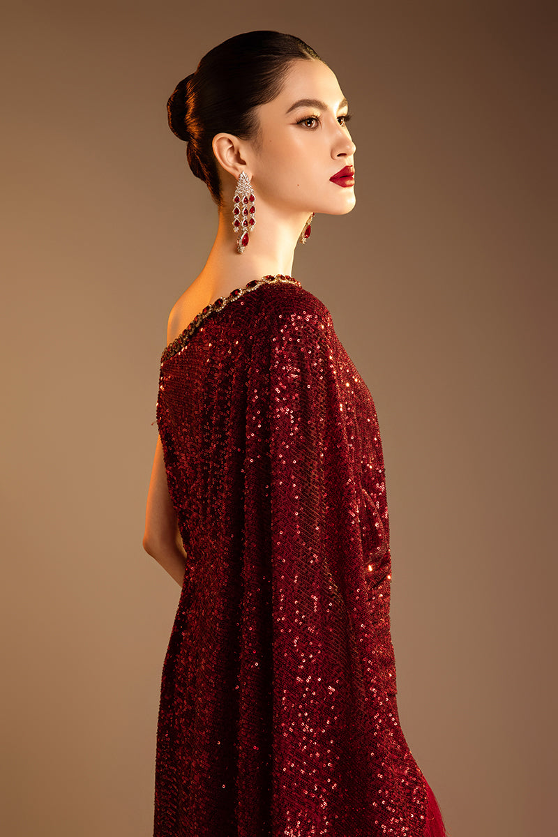 Red Valenciani one-shoulder draped sequin gown with elegant design and sparkling embellishments, perfect for formal occasions.