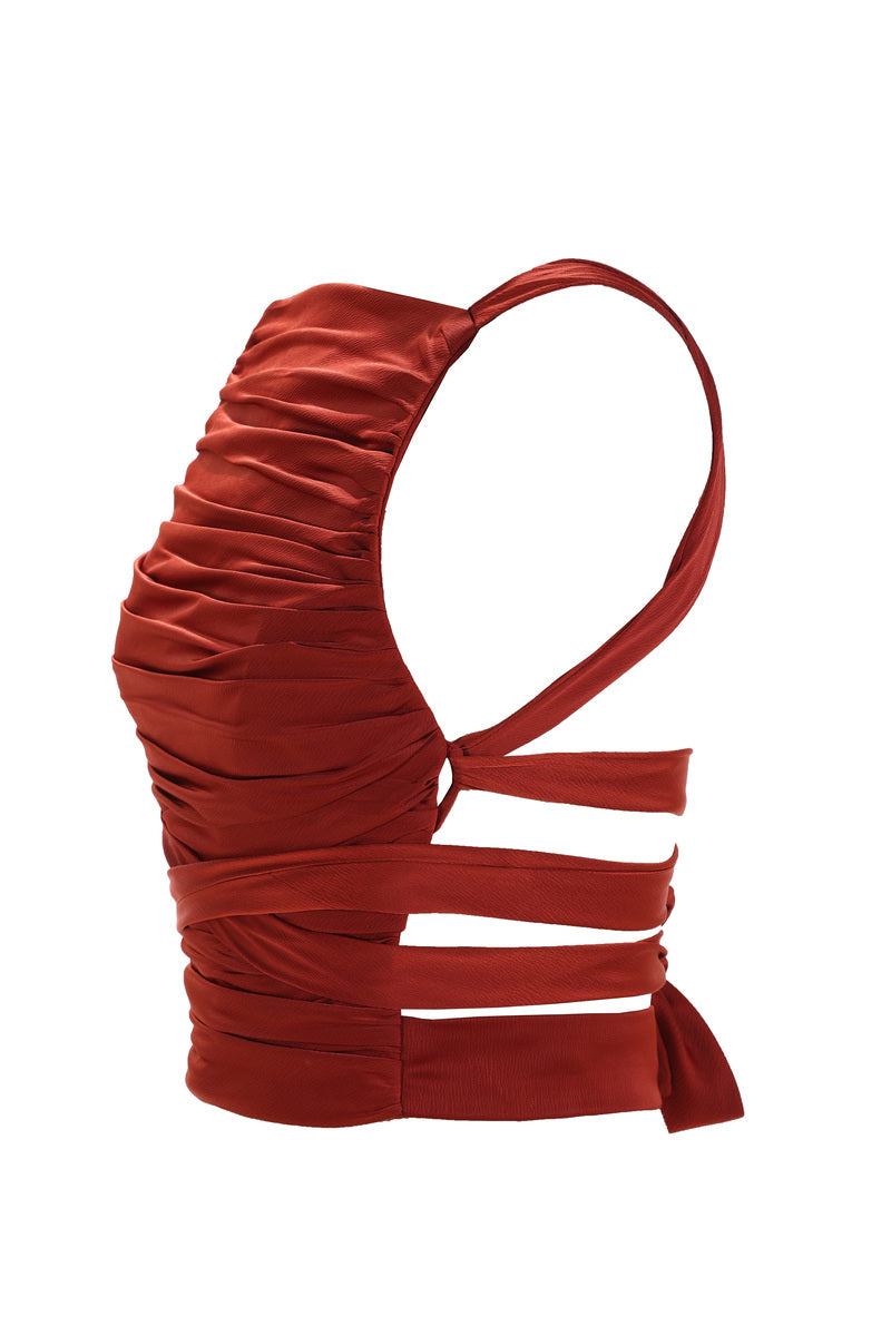 Aquarel Studio ARI TOP in vibrant fabric, featuring a stylish neckline and fitted design, displayed on a hanger.