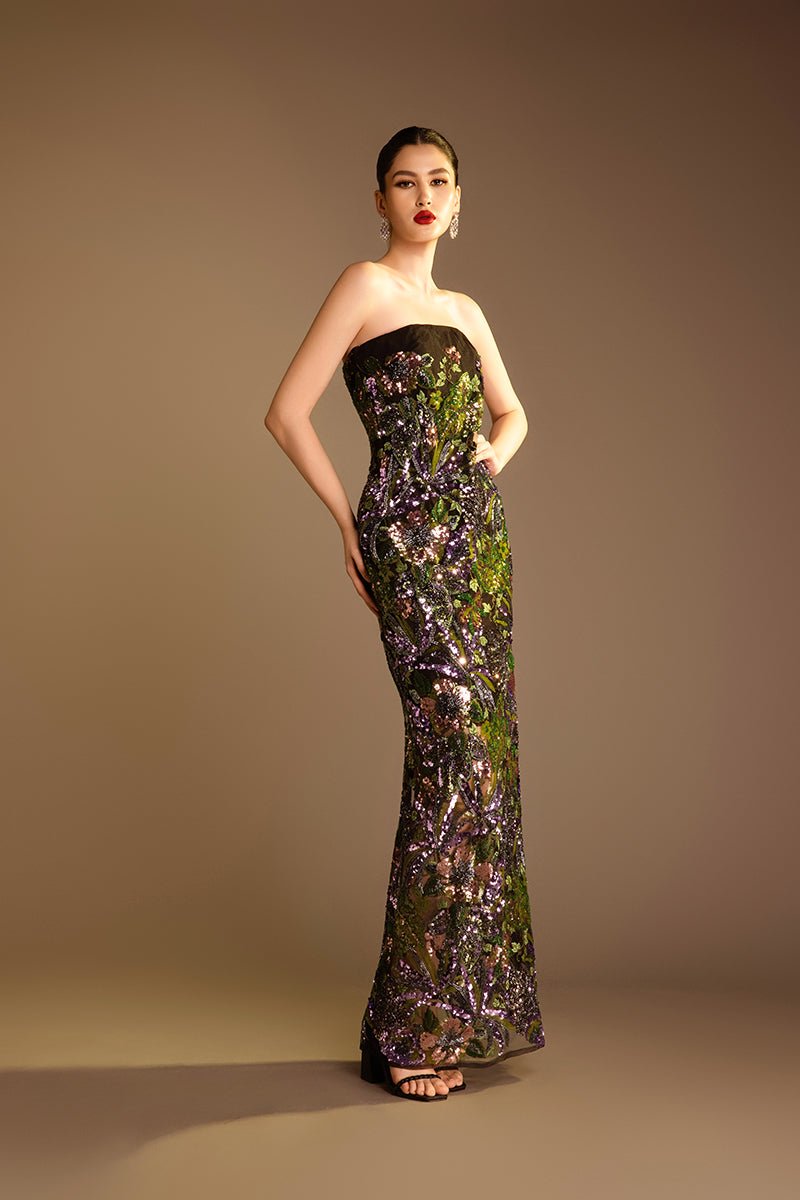 Valenciani strapless sequined gown with a long train cape, elegant evening dress with shimmering embellishments and flowing train.
