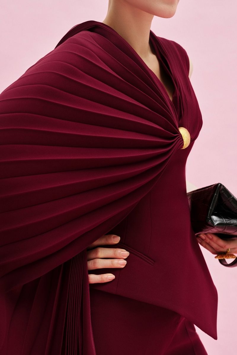 Jenny K Tran Adlington Top in stylish fabric, featuring a modern design with a comfortable fit and elegant details.