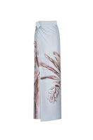 Tinta Latina Agua Maxi Skirt in celestial blue, flowing lightweight fabric with a relaxed fit and waist tie detail.