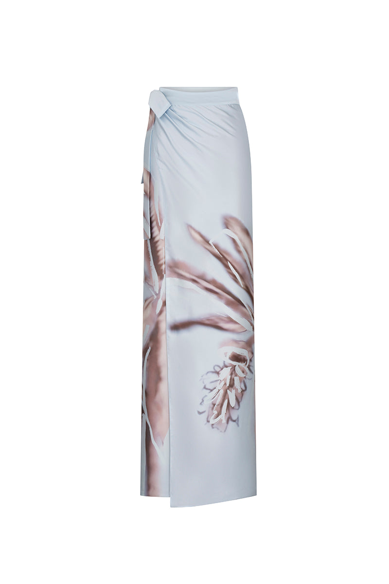 Tinta Latina Agua Maxi Skirt in celestial blue, flowing lightweight fabric with a relaxed fit and waist tie detail.