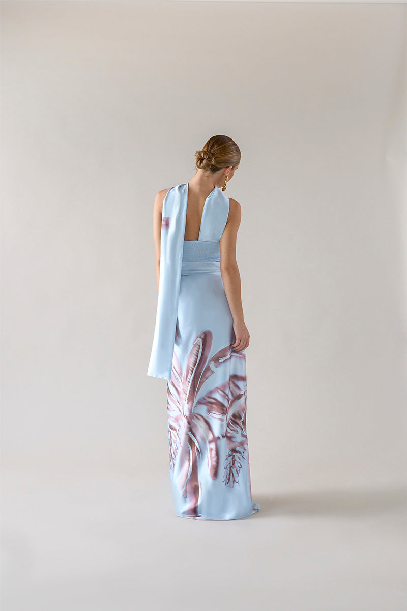 Tinta Latina Agua Maxi Skirt in celestial blue with flowing fabric and waistband, perfect for casual or summer wear.