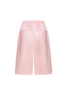 Pink satin wide-leg shorts by ELENAREVA, featuring smooth fabric and relaxed fit, displayed on a neutral background.