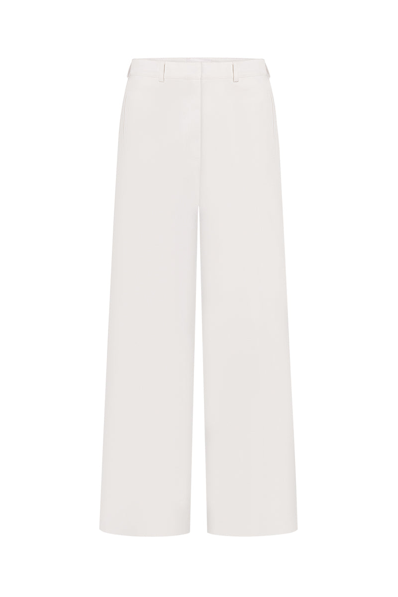 Light-colored ivory straight-leg jeans by ELENAREVA, displayed on a hanger showing the full length and classic denim stitching.