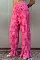 Andrea Iyamah SINA regular pants in vibrant magenta, showcasing a stylish and comfortable fit with a sleek design.