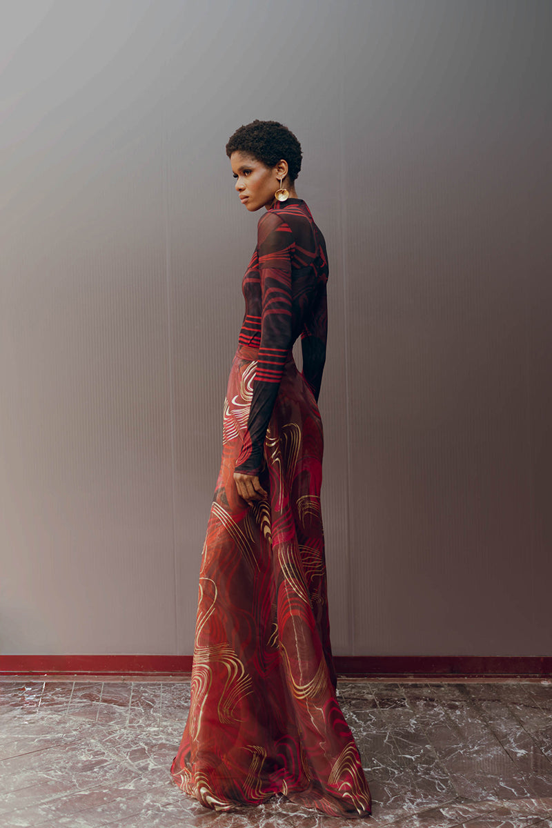 Andrea Iyamah LOMA mesh bodysuit in Corda DK print featuring a fitted design and intricate mesh fabric.