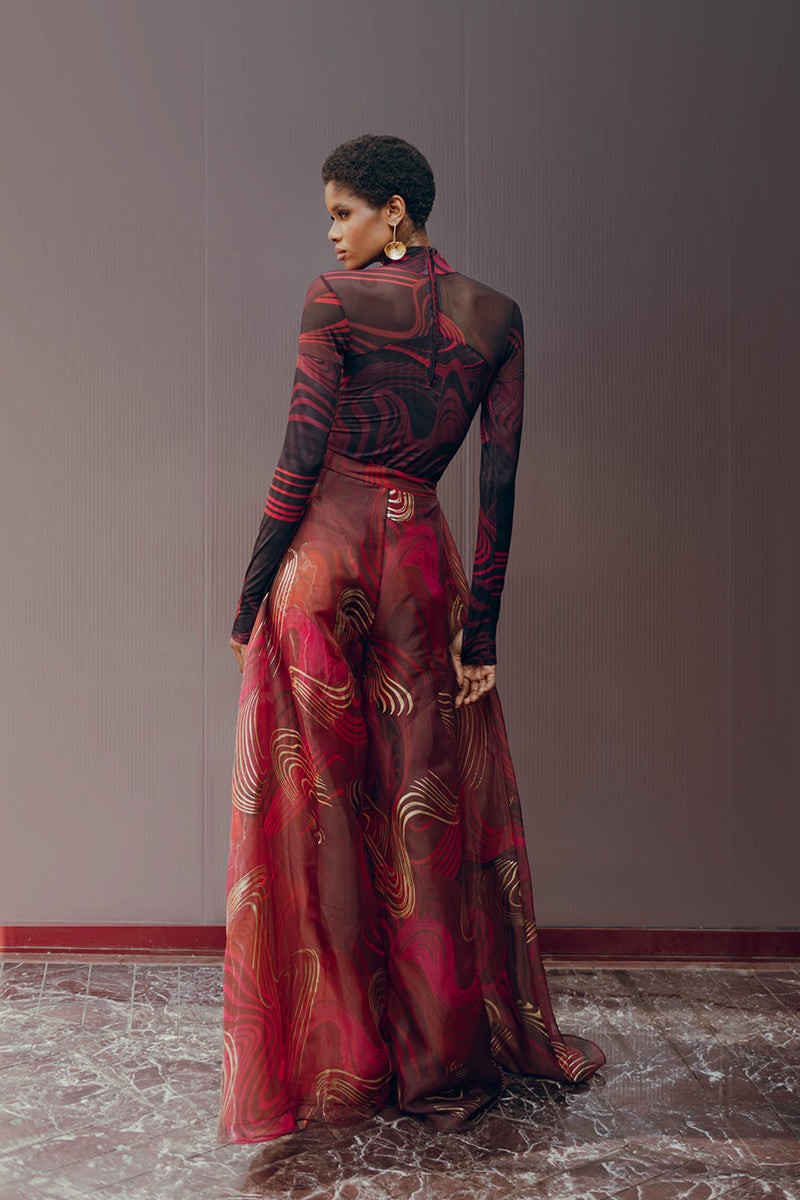 Andrea Iyamah LOMA mesh bodysuit in Corda DK print, featuring a stylish, fitted mesh top with intricate design details.