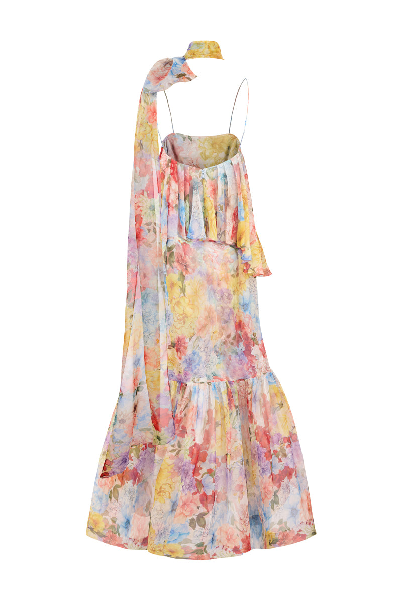 AISA Valentina maxi dress in flowing fabric with a fitted waist and floral pattern, displayed on a hanger.