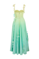 AISA PIA gown displayed on a hanger, featuring a flowing design with intricate detailing and elegant fabric perfect for formal occasions.