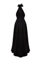 Elegant luminous gown by AISA featuring flowing fabric and subtle shimmer, perfect for formal occasions.