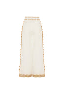 A pair of white natural Dune pants by AISA with a relaxed fit, shown laid flat on a neutral background.