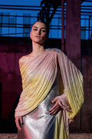 Elegant draped chiffon sequin gown by AKHL featuring flowing fabric and sparkling details, perfect for formal occasions.