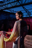 Elegant draped chiffon sequined gown by AKHL featuring flowing fabric and shimmering embellishments for formal occasions.