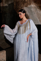 Powder blue angular gathered kaftan maxi dress by AKHL, flowing fabric with pleated detailing and relaxed fit.