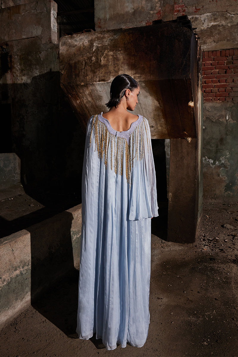 Powder blue angular gathered maxi kaftan dress by AKHL featuring flowing fabric and relaxed fit, perfect for casual or beachwear.