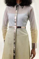 Metallic shirt dress from AKHL, a stylish maxi dress with a shiny finish, featuring a button-front design and long sleeves.