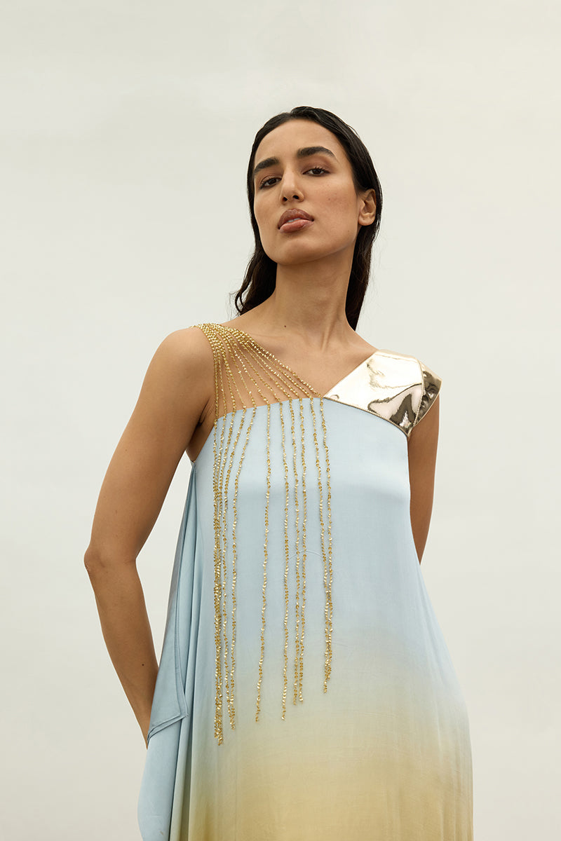 Shimmering metallic and sequin asymmetric maxi dress by AKHL with stylish draped design and elegant silhouette.