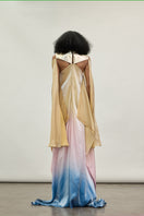 Gold Spectrum gown by AKHL featuring a flowing design with intricate detailing, perfect for elegant occasions.