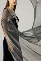 Elegant metallic velvet gown by AKHL featuring a sleek silhouette and luxurious fabric, perfect for formal occasions.