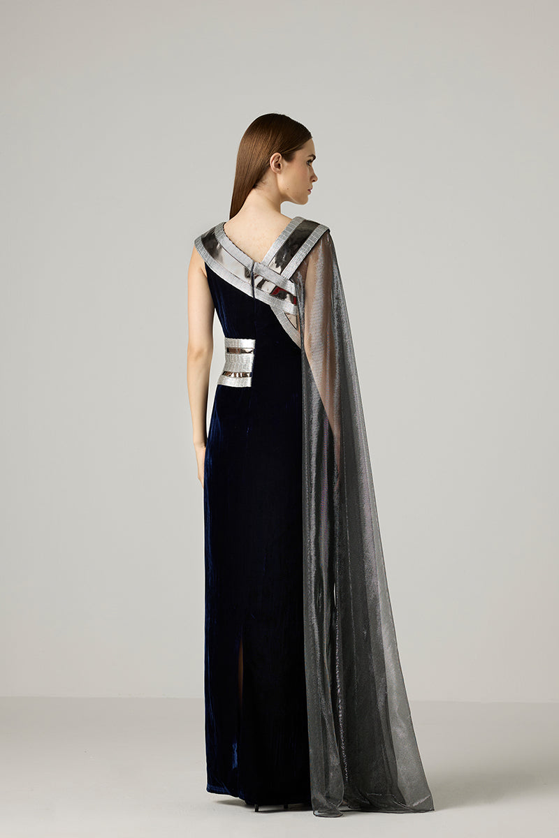 Silver metallic velvet gown by AKHL, featuring a flowing design with elegant fabric and stylish details.