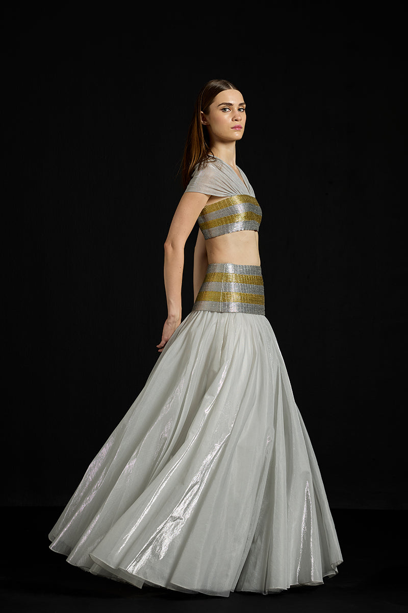 Zari striped metallic co-ords ensemble by AKHL featuring a matching top and bottom with vibrant metallic accents.
