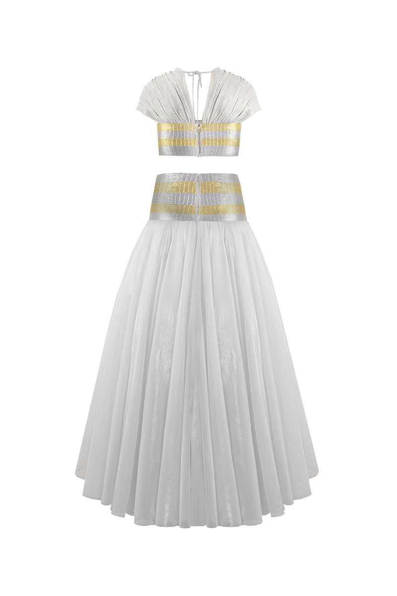 Back view of AKHL Zari striped metallic co-ord set with matching top and skirt, featuring shiny metallic fabric and intricate stripe design.