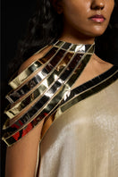 Silver metallic yoke asymmetric kaftan gown by AKHL, featuring flowing fabric and elegant design with a unique asymmetric style.
