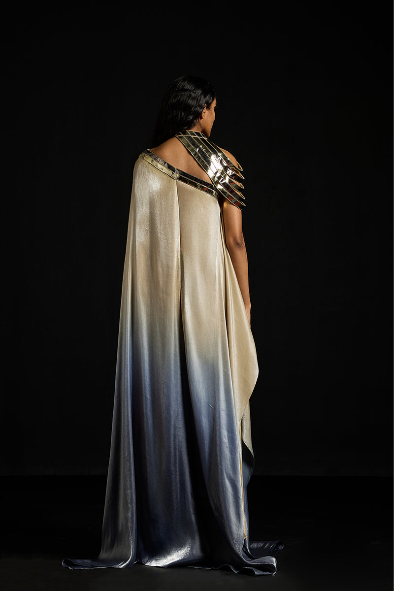Metallic yoke asymmetric kaftan gown by AKHL featuring a shimmering metallic yoke and flowing design.