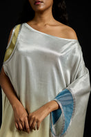 Elegant asymmetric gradient satin maxi kaftan by AKHL, flowing fabric with stylish drape and vibrant color transitions.