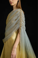 Elegant gathered draped tulle satin gown by AKHL featuring flowing fabric and sophisticated design.