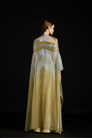 Elegant satin overlay metallic gown by AKHL, featuring a flowing design and shimmering fabric for formal occasions.