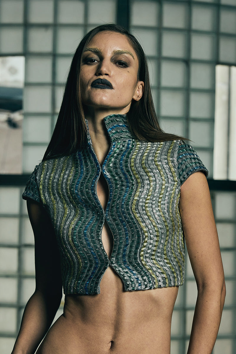 Handwoven wave pattern cropped gilet jacket by AKHL, featuring textured fabric and a stylish, modern design.