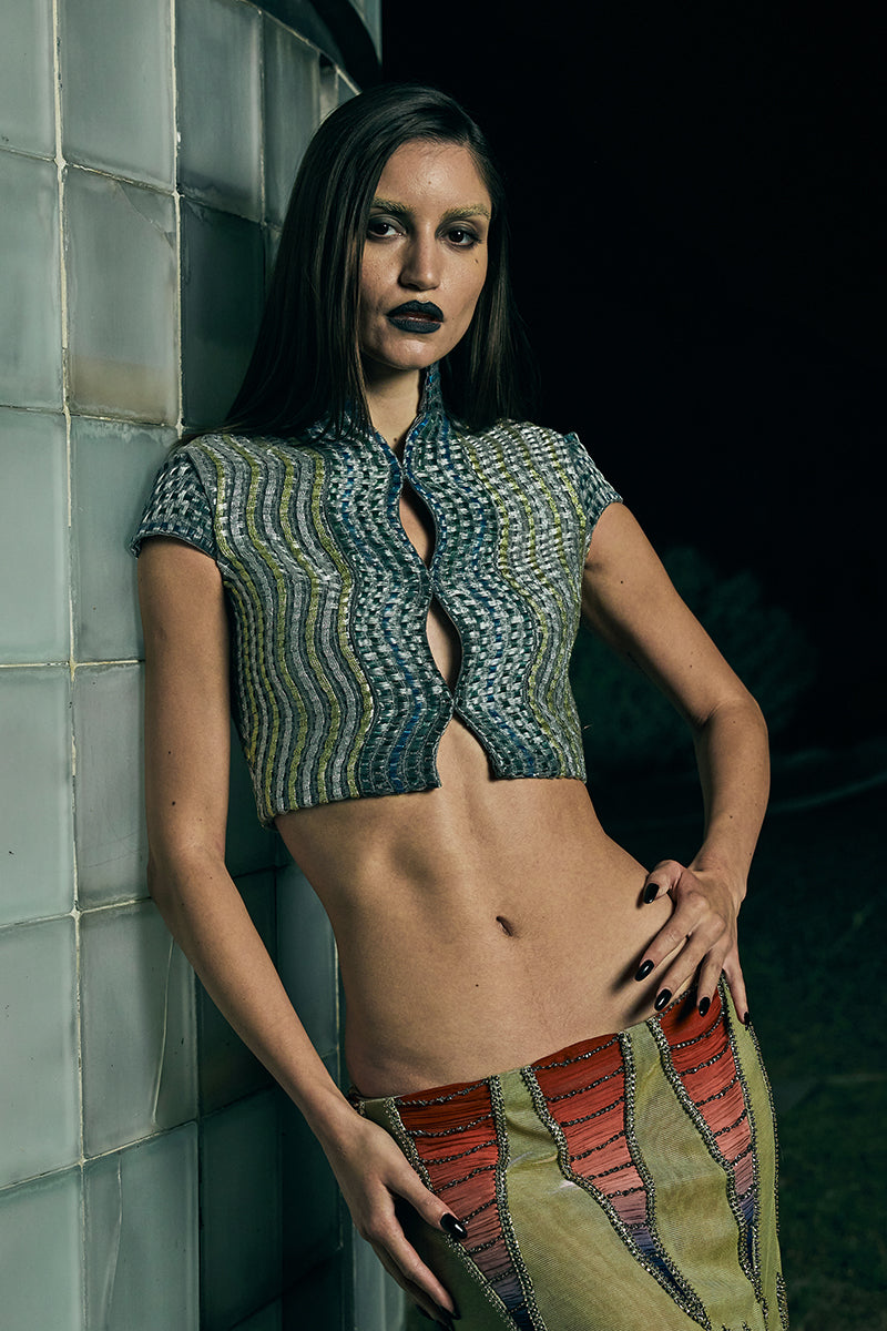 Handwoven wave cropped gilet from AKHL, stylish jacket with textured wave pattern, sleeveless design, and lightweight fabric.