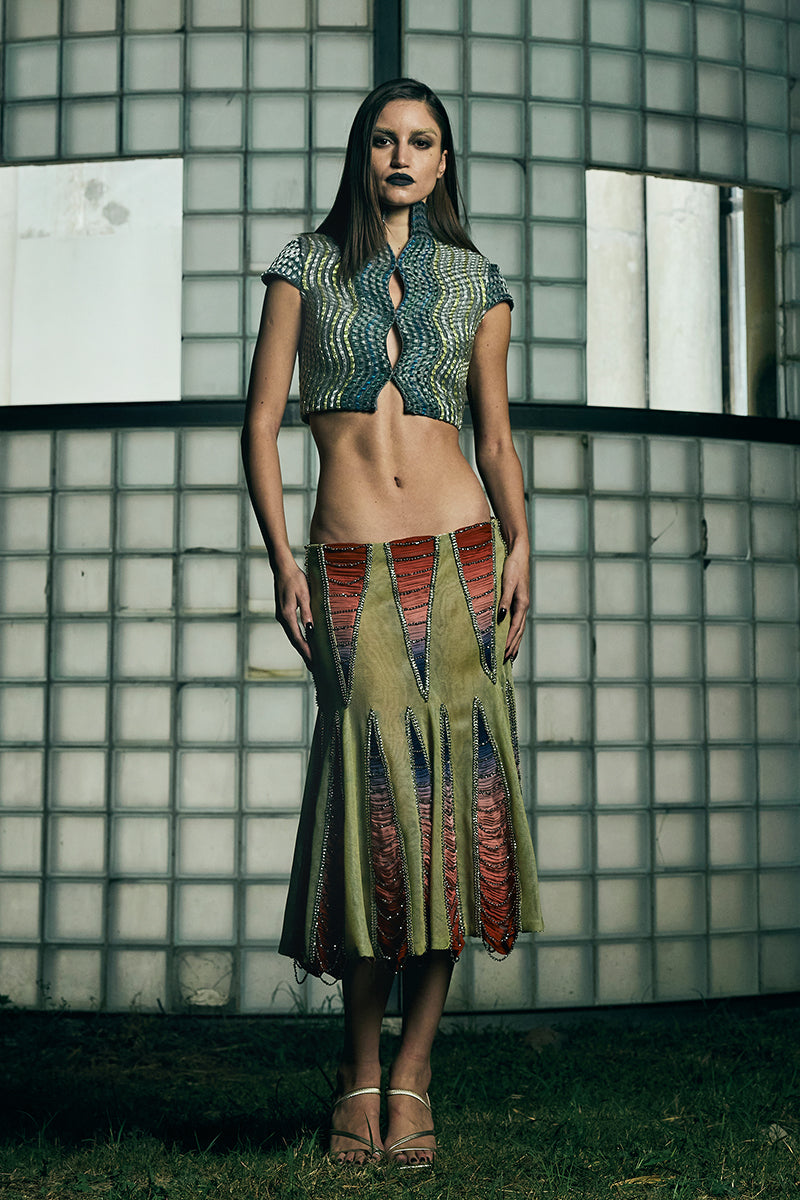 Handwoven wave-patterned cropped gilet jacket by AKHL, featuring textured design and lightweight fit, perfect for layered styling.