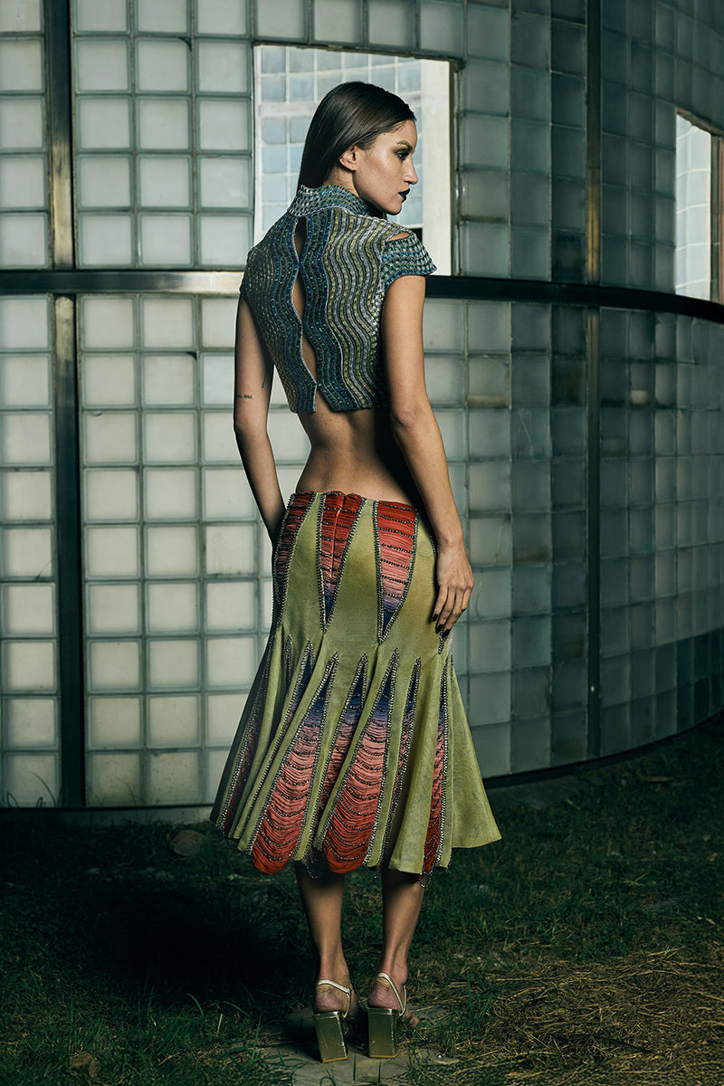 Handwoven wave pattern cropped gilet jacket by AKHL, featuring textured knit design and sleeveless style for a modern look
